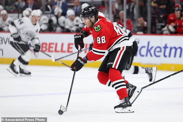 Chicago Blackhawks right wing Patrick Kane (88) skates with the puck during the first period of an NHL hockey game against the Los Angeles Kings, Tuesday, Oct. 27, 2026, in Chicago. (AP Photo/Jessie Alcheh)
