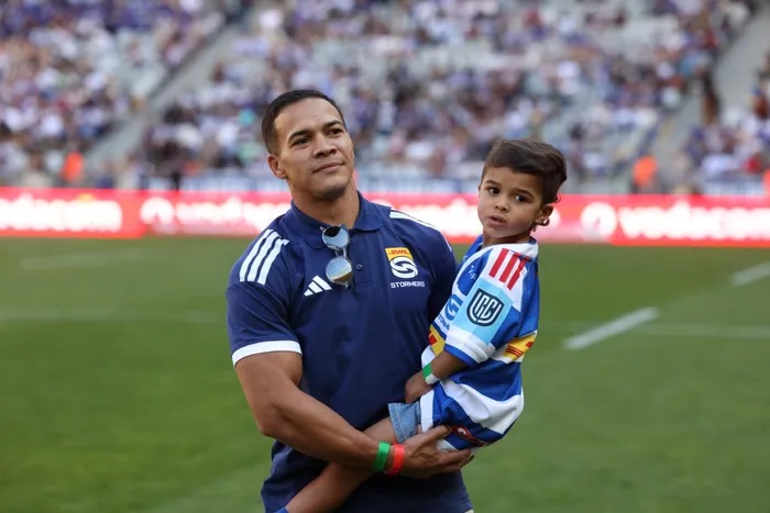 Springbok and Stormers star Cheslin Kolbe with his son Cayden during his official unveiling at DHL Stadium a couple of weeks ago ahead of the URC match against the Sharks.