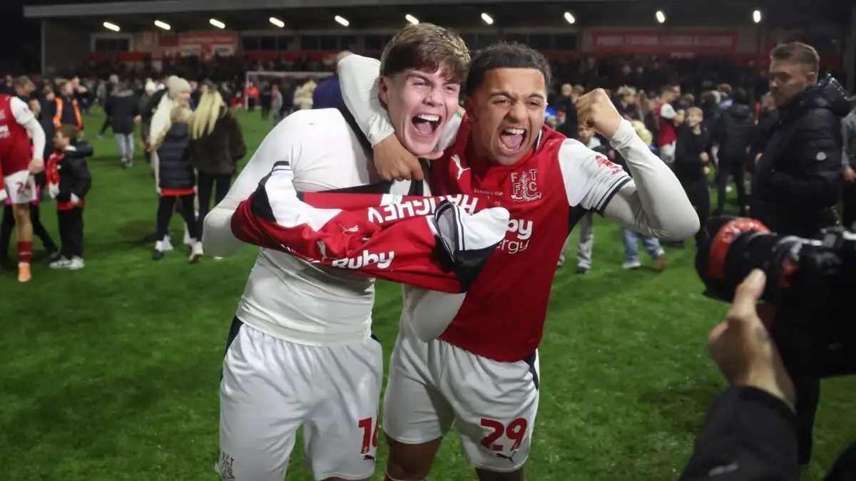 Fleetwood, UK. 27th Oct, 2026. FLEETWOOD, ENGLAND - OCTOBER 27: Conor Haughey of Fleetwood Town celebrates with Raffaele Cirino of Fleetwood Town after scoring the winning penalty kick in the penalty shoot out as Fleetwood Town FC beat Arsenal FC on penalty kicks during the Carabao Cup Last 16 match between Fleetwood Town FC v Arsenal FC at Highbury Stadium on October 27, 2026 in Fleetwood, England.
