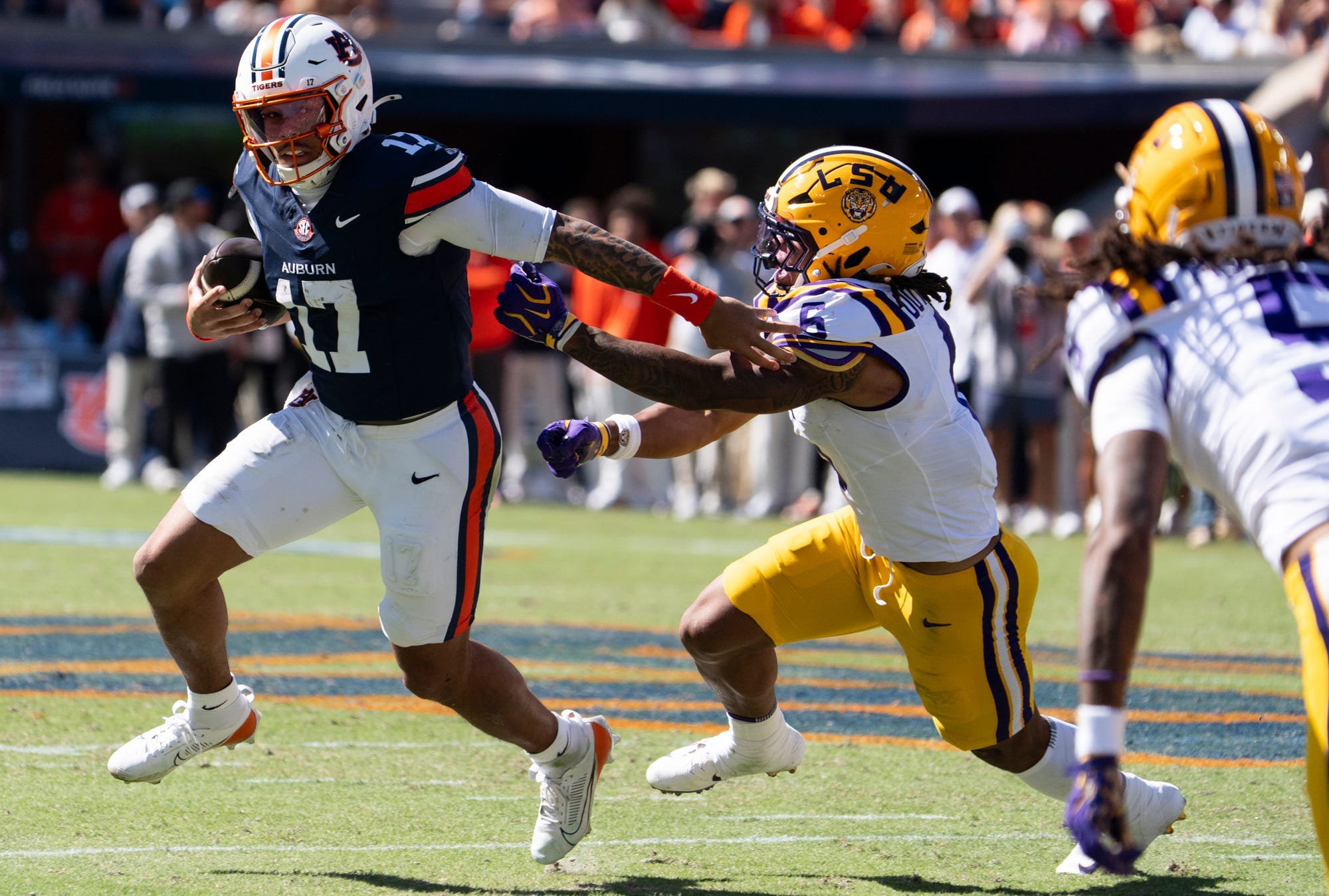 Auburn Tigers quarterback Byrum Brown (17) runs the ball as Auburn Tigers take on LSU Tigers at Jordan-Hare Stadium in Auburn, Ala. on Saturday, Oct. 24, 2026. LSU Tigers lead Auburn Tigers 31-10 at halftime.