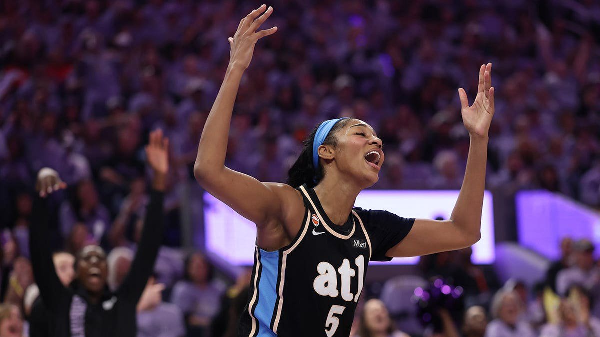 Angel Reese of the Atlanta Dream reacts during the second quarter of a WNBA Finals game.