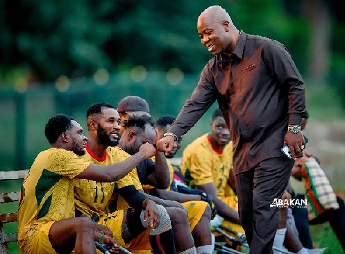 Samson Deen exchanges pleasantries with Black Challenge technical team after the training