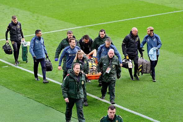 Emi Martinez being stretchered off.