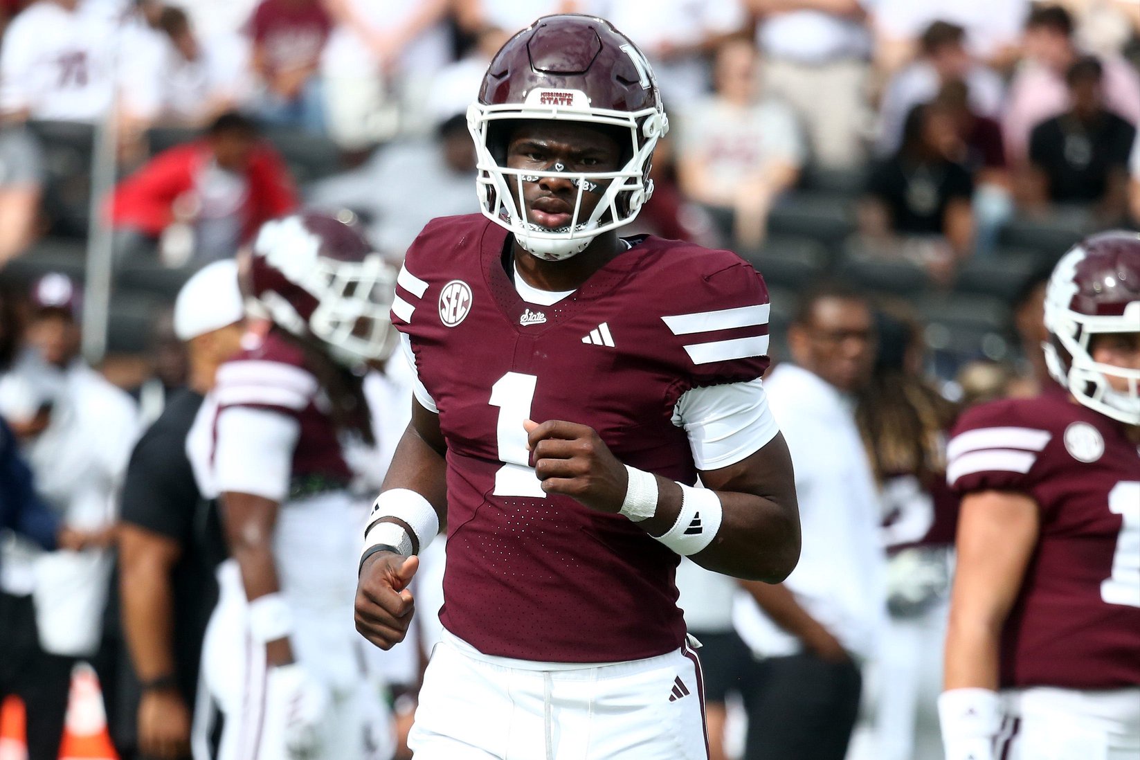 Oct 3, 2026; Starkville, Mississippi, USA; Mississippi State Bulldogs quarterback Kamario Taylor (1) jogs onto the field during warm ups prior to the game against the Alabama Crimson Tide at Davis Wade Stadium at Scott Field. Mandatory Credit: Petre Thomas-Imagn Images