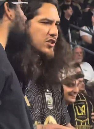 The man was seen arguin with the woman and two men in the row in front of him