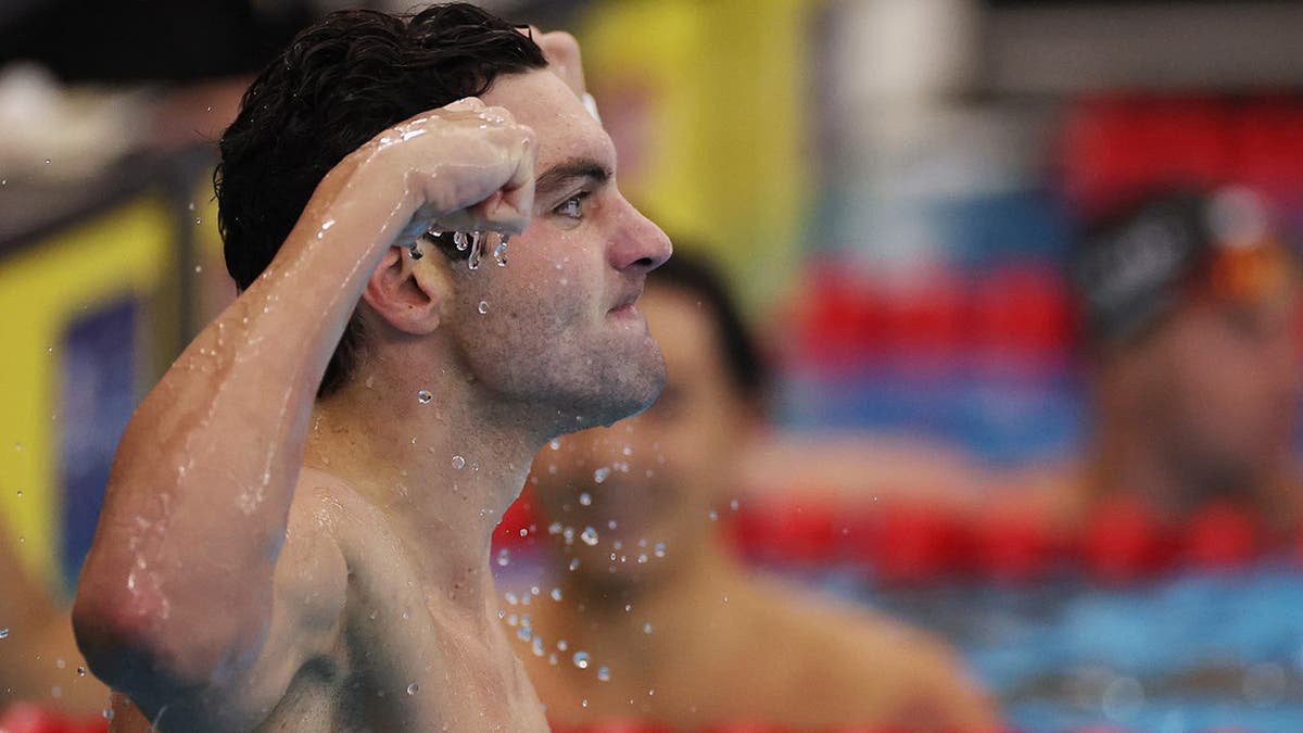 Jack Alexy competes in the Men's 100m Freestyle final, setting a world record.