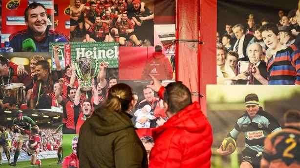 Munster supporters look at the mural for the late Anthony 'Axel' Foley