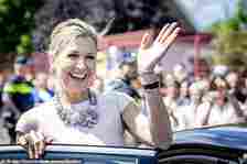 Queen Máxima beamed as she waved to crowds, clearly enjoying being outdoors on a sunny day