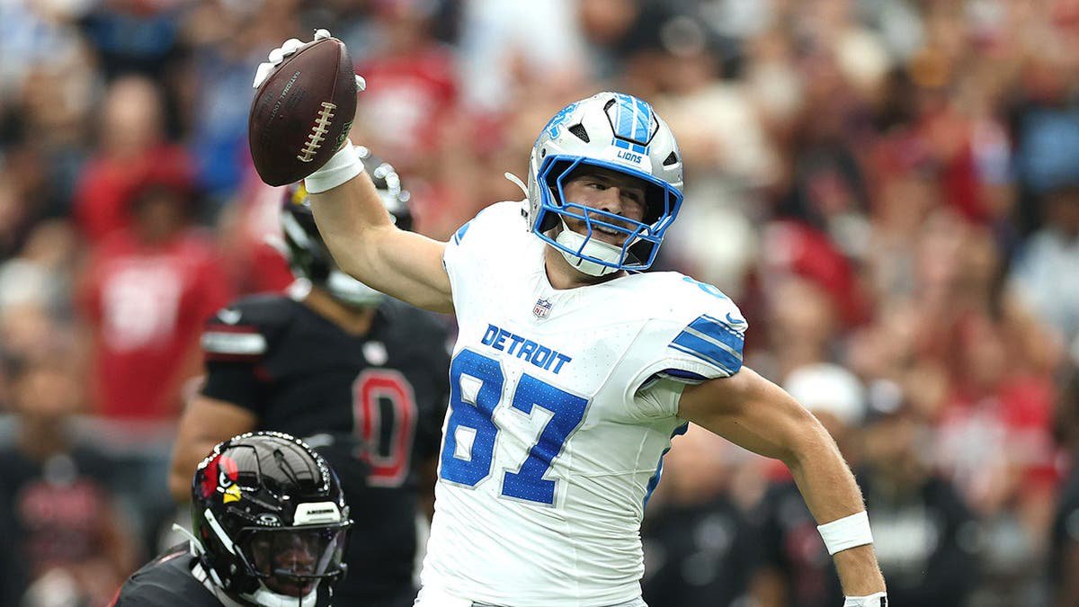 Sam LaPorta celebrates during the second quarter against the Arizona Cardinals.