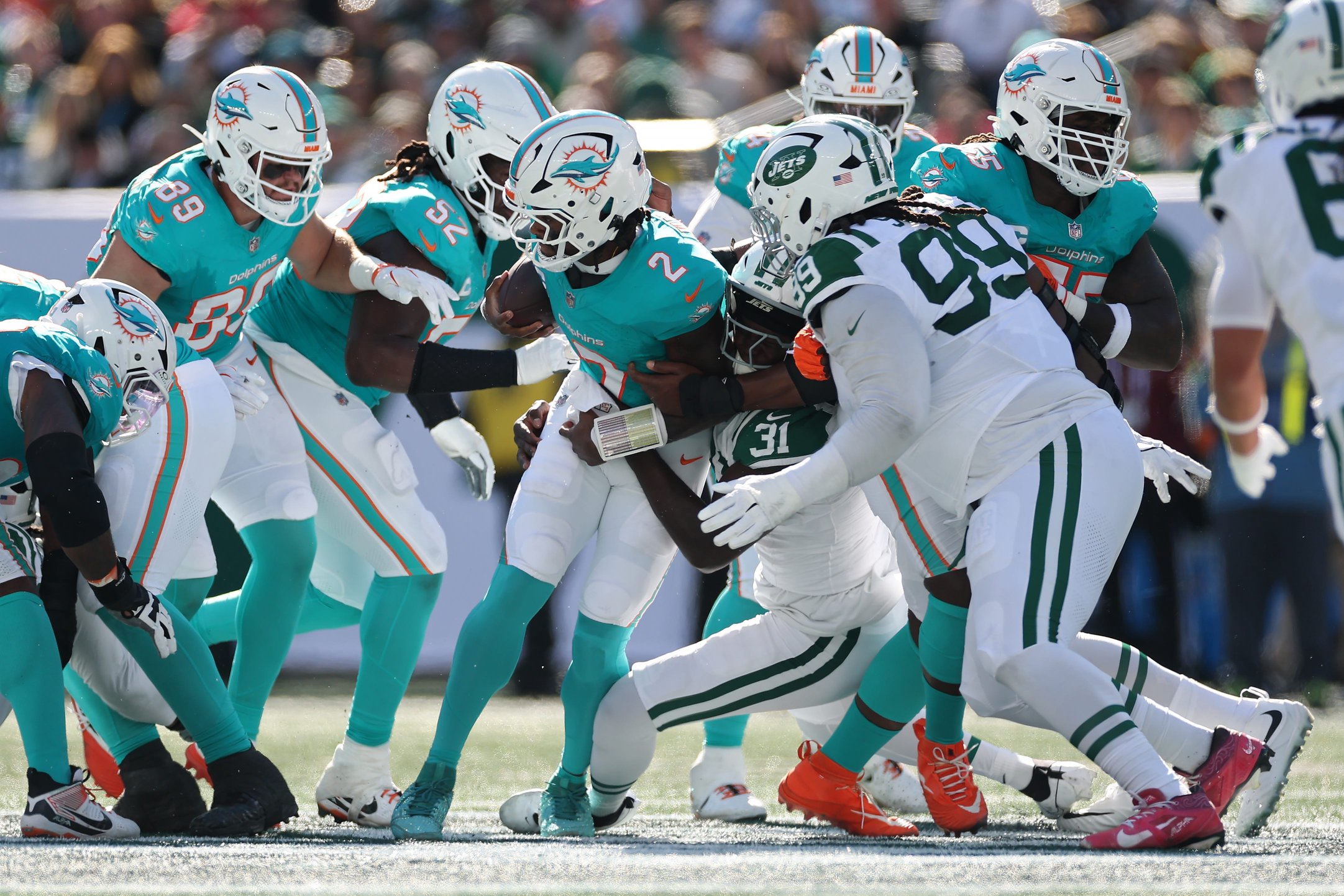 Malik Willis #2, Miami Dolphins &amp; David Bailey #31, New York Jets (Photo by Sarah Stier/Getty Images)