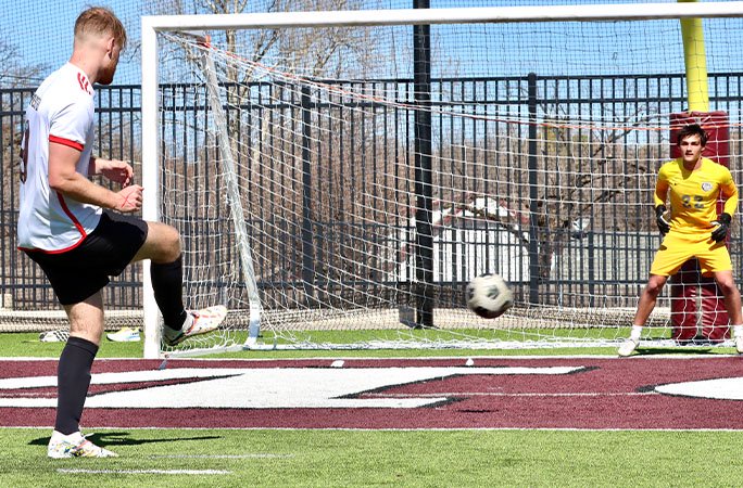 Sam shooting a penalty