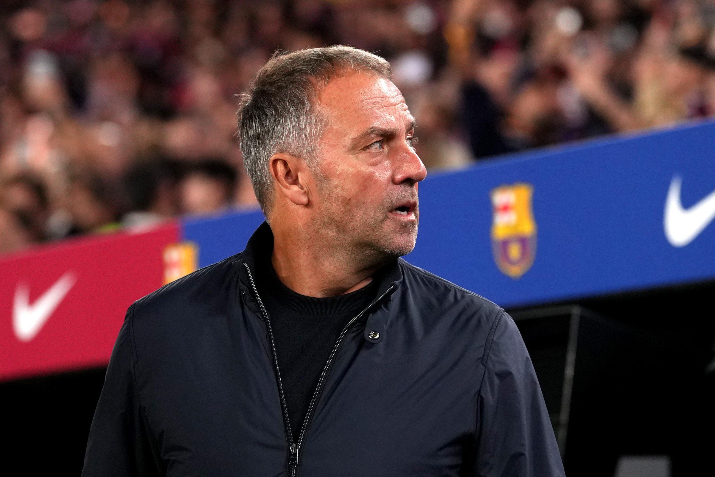 BARCELONA, SPAIN - OCTOBER 25: Hansi Flick, Manager of FC Barcelona, looks on before the LaLiga EA Sports 2026/27 match between FC Barcelona and Real Madrid at Spotify Camp Nou on October 25, 2026 in Barcelona, Spain. (Photo by Alex Caparros/Getty Images)