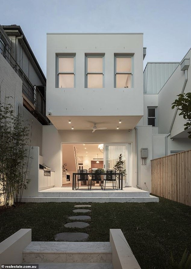Once a dilapidated terrace house containing eight squalid bedsits on a main road of thundering traffic, the Boguts¿ revived Italianate mansion boasts marble kitchen and bathrooms and double glazing