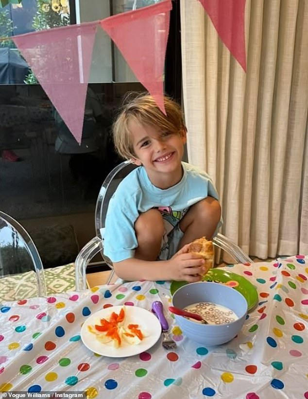Taking to Instagram with an array of snaps of her eldest she wrote: 'Our first baby is 8! Happy birthday sweet, kind, football mad Theodore… the best big brother'