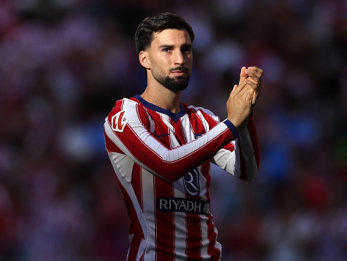 Alex Baena applauds the Atletico Madrid fans