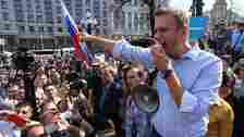 Alexei Navalny addresses a crowd, before his imprisonment 