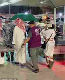 Crews have been seen carrying away corpses amid the deadly heatwave in Saudi Arabia