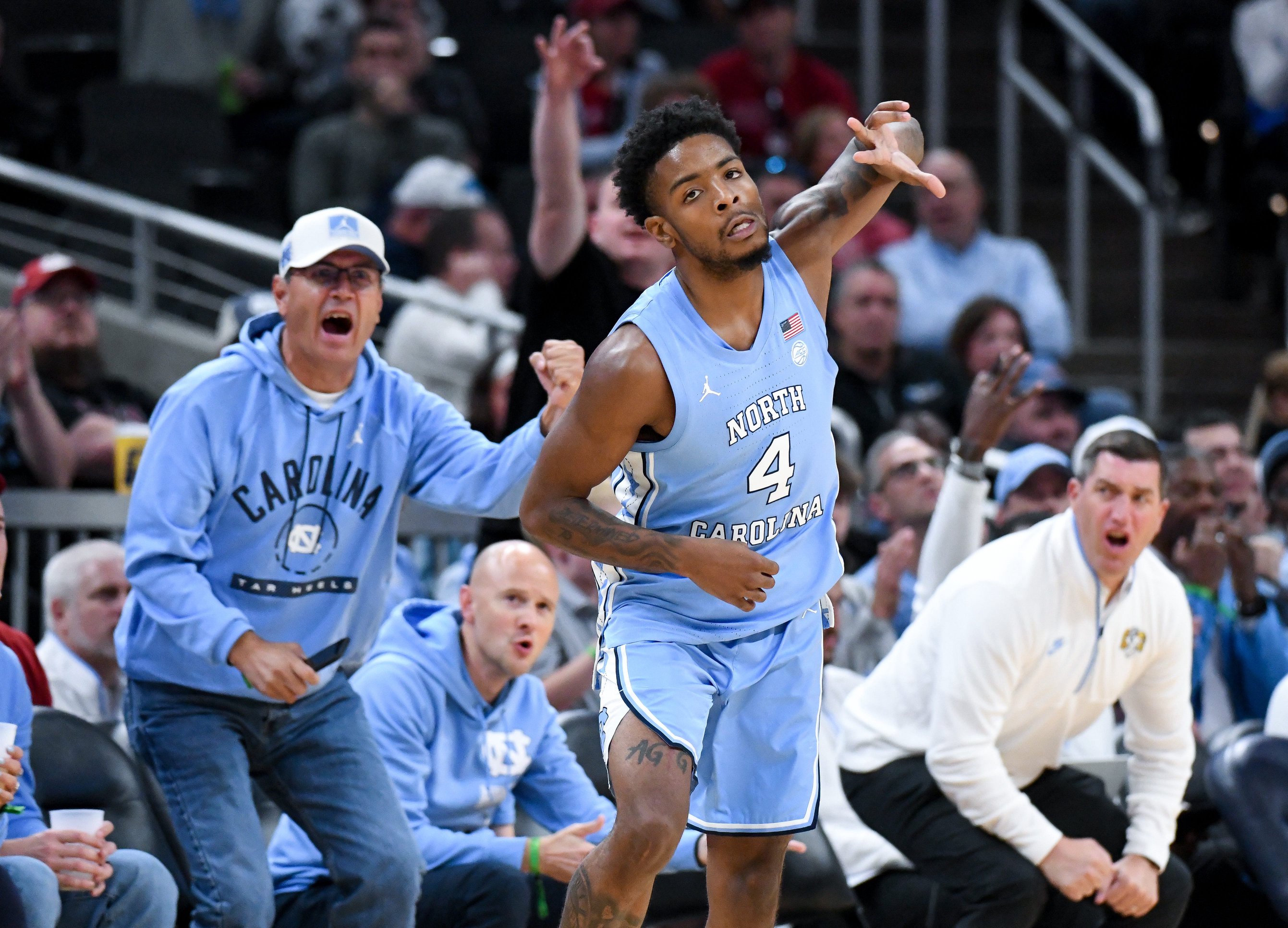 Oct 18, 2026; Indianapolis, IN, USA; North Carolina Tar Heels guard Jaydon Young (4) celebrates after making a three-pointer against the Indiana Hoosiers during the second half at Gainbridge Fieldhouse. Mandatory Credit: Robert Goddin-Imagn Images