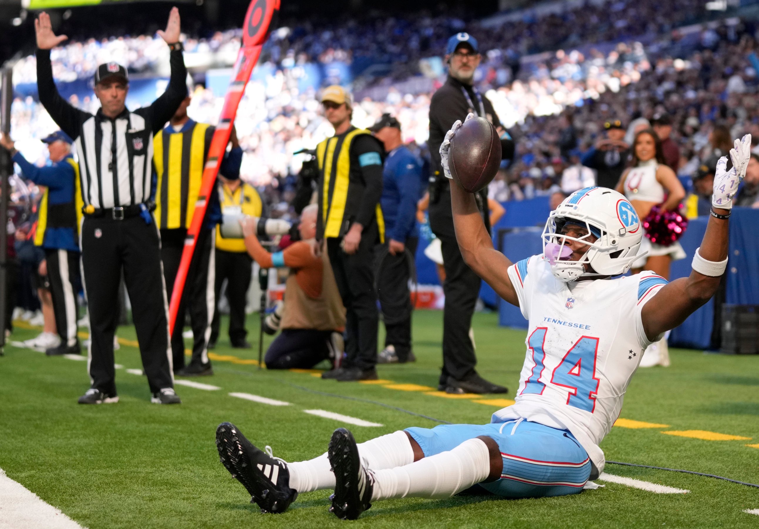 Titans rookie wide receiver Carnell Tate celebrates his first NFL touchdown reception in a Week 6 game against the Colts.