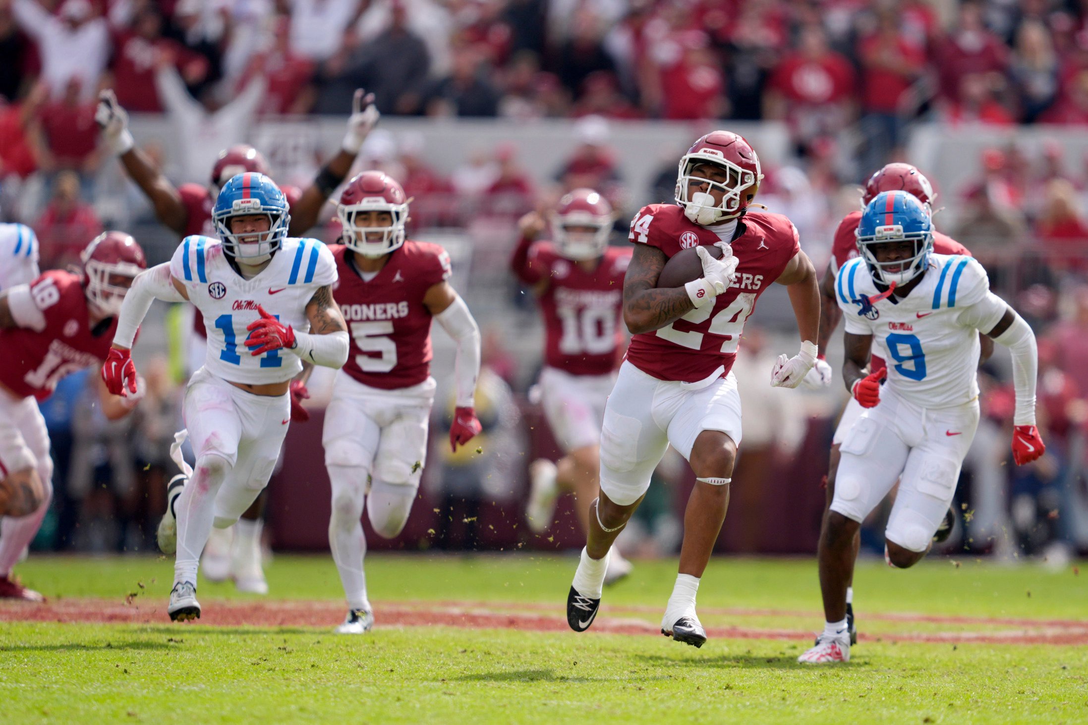 Oklahoma Sooners running back Xavier Robinson (24) runs for a touchdown during a college football game between the University of Oklahoma Sooners (OU) and the Ole Miss Rebels at Gaylord Family Ã Oklahoma Memorial Stadium in Norman, Okla., Saturday, Oct. 25, 2025. Ole Miss won 34-26.