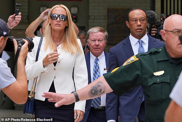 Trump was by the 15-time major winner's side as he arrived at court last month