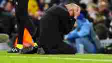 Pep Guardiola on his knees