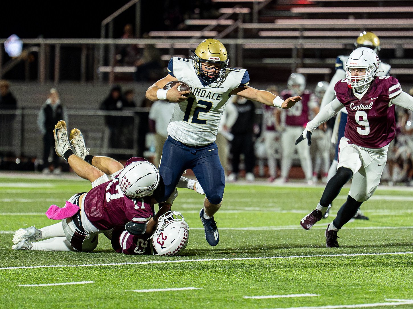 Fairdale's Brayden Martin (12) runs over defenders during the second half as the Fairdale Bulldogs face the Bullitt Central Cougars in a high school football game at Cougar Stadium in Shepherdsville, Ky., on Friday, Oct. 16, 2026.