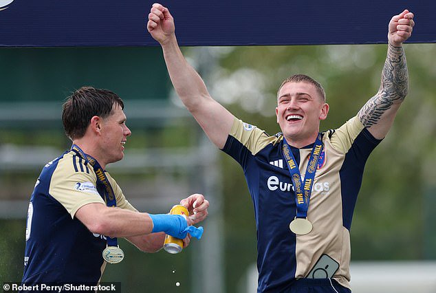 John Robertson (right) celebrates East Kilbride's League Two triumph with Lewis Spence