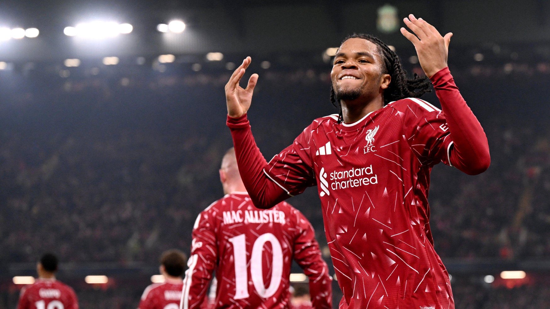 Rio Ngumoha walks off to a standing ovation from the Anfield crowd.