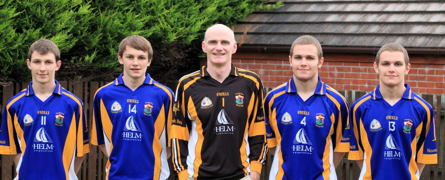 Five guys named Mackle: Conor, Ronan, dad John, Ciaran and Ryan, who all played together for St Brigid's, Belfast.