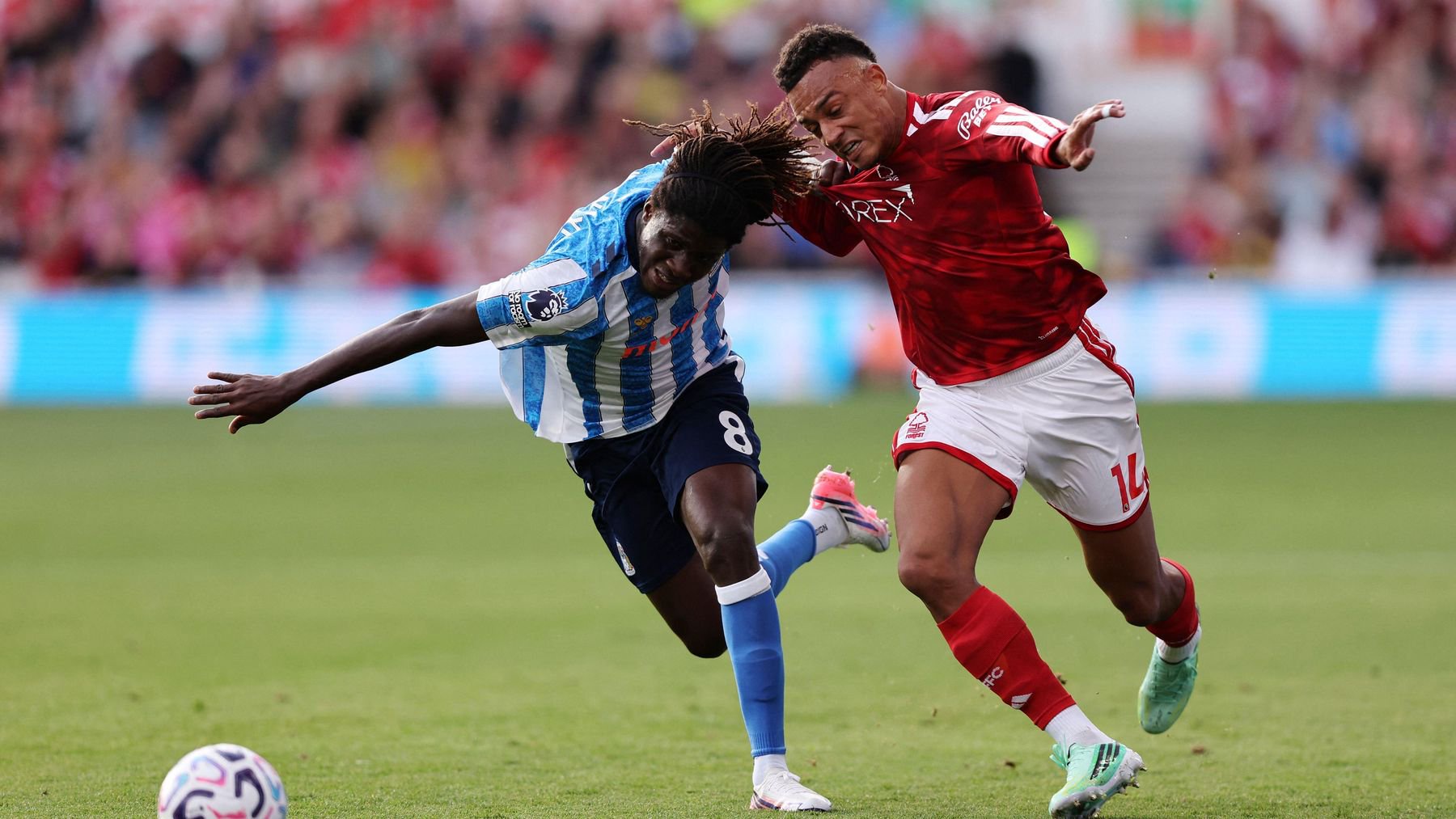 Caleb Yirenkyi tussling at Nottingham Forest