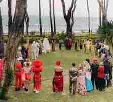 Carly and her 'brooms' stood in a 'circle of togetherness' as they exchanged vows and beads