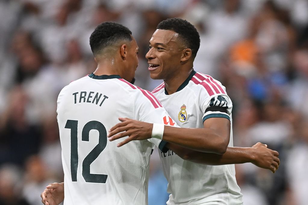 Kylian Mbappe celebrates with Trent Alexander-Arnold after scoring for Real Madrid against Malaga.