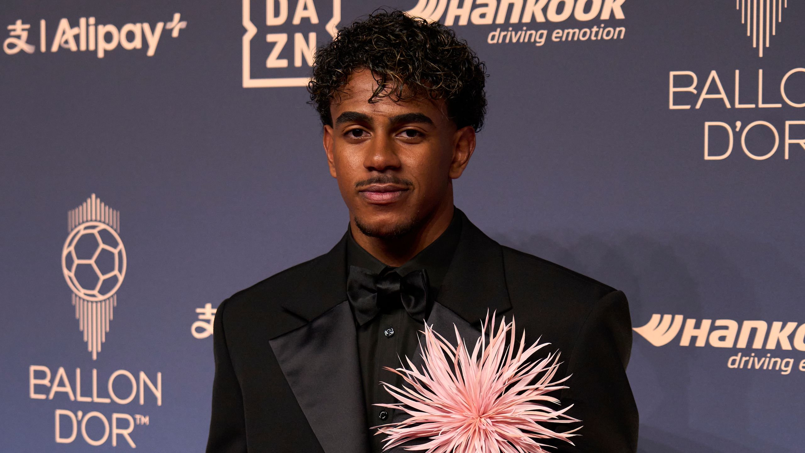 Image may contain Francisco Lindor Clothing Formal Wear Suit Face Head Person Photography Portrait and Adult