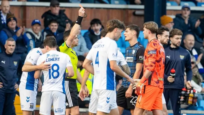 St Johnstone's Toby Steward is shown the red card