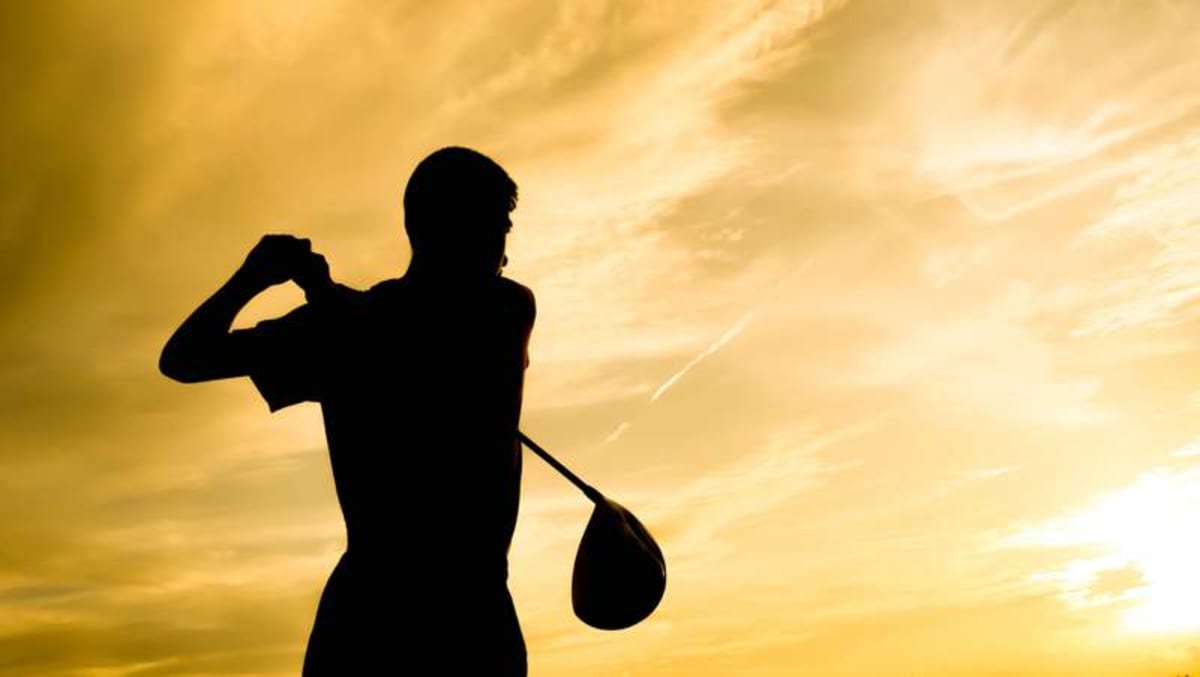 Golfer silhouette swinging at sunset design background, Golfer silhouette swinging at sunset design background ©IMAGO/Dreamstime