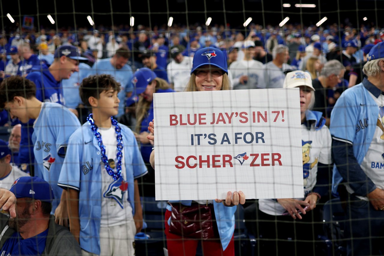 TORONTO, ON - NOVEMBER 01:  A Blue Jays fan holds up a sign prior to Game Seven of the 2025 World Series presented by Capital One between the Los Angeles Dodgers and the Toronto Blue Jays at Rogers Centre on Saturday, November 1, 2025 in Toronto, Ontario, Canada. (Photo by Rob Tringali/MLB Photos via Getty Images)