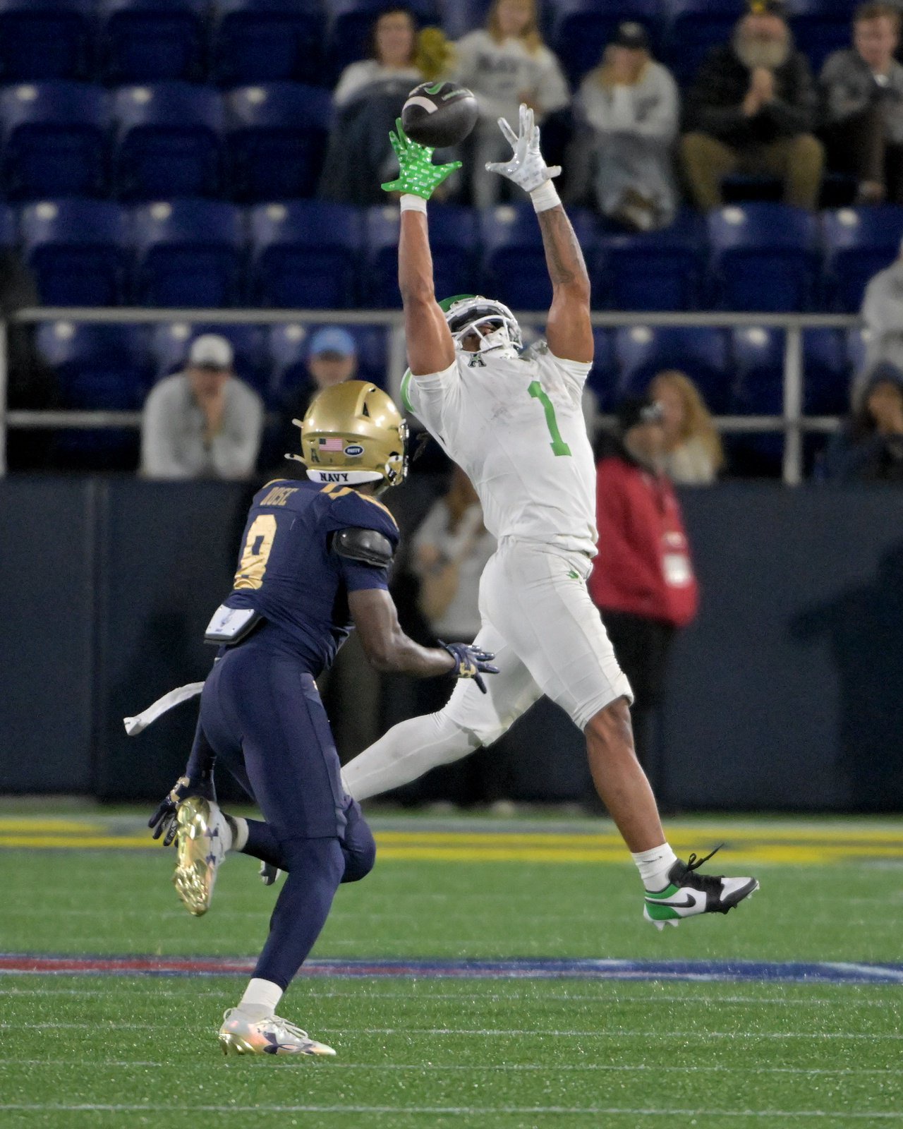 North Texas Mean Green running back Jahiem White #1 makes a big fourth and one catch for a first down, sealing the game. The visiting North Texas Mean Green defeat the Navy Midshipmen, 49-39, in an NCAA football game Saturday at Navy-Marine Corps Memorial Stadium in Annapolis. (Paul W. Gillespie/Staff)