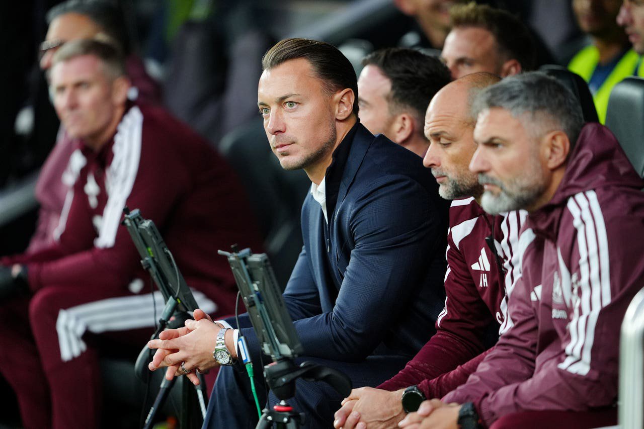 Matthias Jaissle sits in the dugout