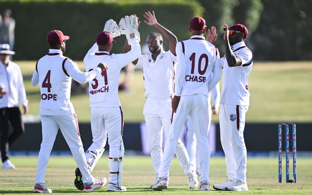 West Indies bowler Kemar Roach celebrates the wicket of Latham during play on Day 1 of the 3rd cricket test match between New Zealand and West Indies at Bay Oval in Mt Maunganui, New Zealand. Thursday 18 December 2025. © Photo: Andrew Cornaga / Photosport
