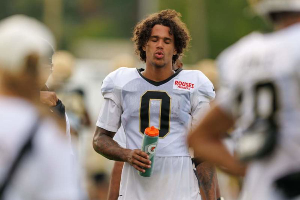 Aug 08, 2026; Metairie, LA, USA; New Orleans Saints wide receiver Jordyn Tyson (0) get a drink on a break during training camp at Ochsner Sports Performance Center. © Stephen Lew-Imagn Images