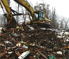 Trash at Donald Comb's residence in Goshen Township was piled nearly 20 feet high.
