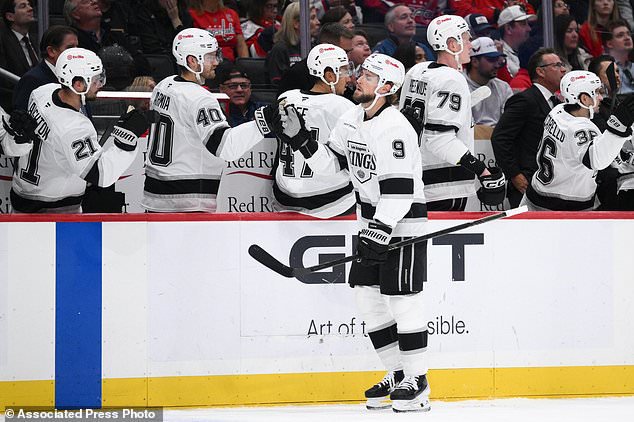 Los Angeles Kings right wing Adrian Kempe (9) celebrates his goal during the first period of an NHL hockey game against the Washington Capitals, Tuesday, Oct. 20, 2026, in Washington. (AP Photo/Nick Wass)