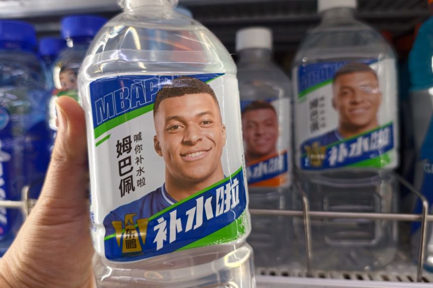 Electrolyte drink bottles featuring Real Madrid forward Kylian Mbappé at a supermarket in Yichang, China, on October 27, 2026.