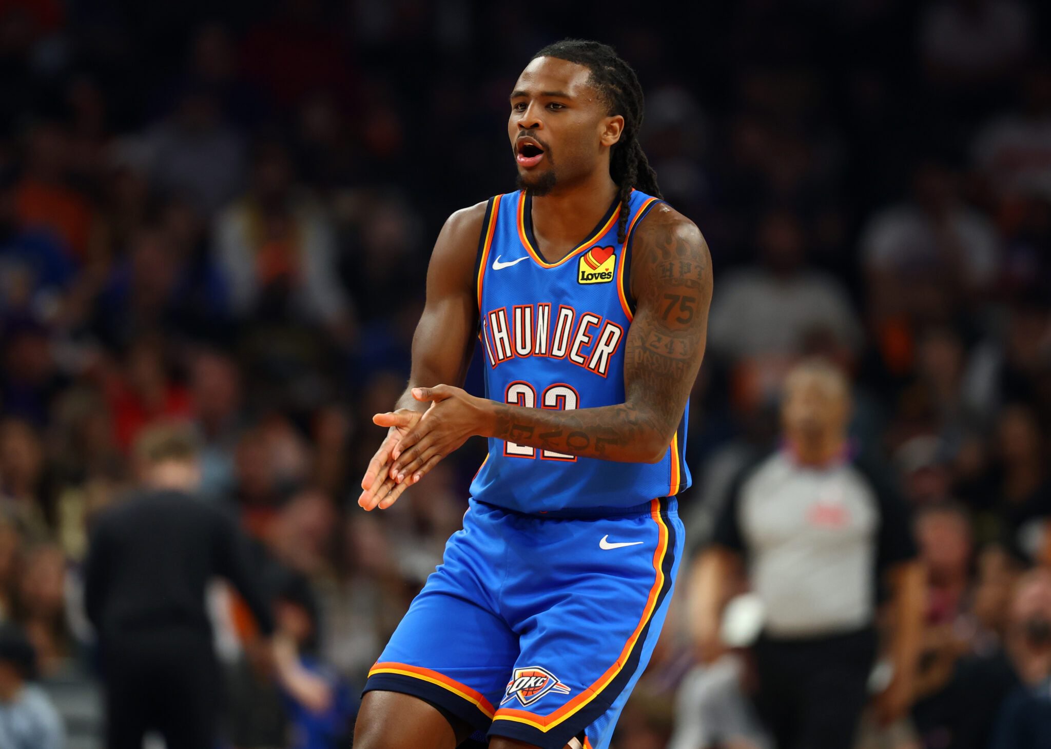 Apr 27, 2026; Phoenix, Arizona, USA; Oklahoma City Thunder guard Cason Wallace (22) against the Phoenix Suns during game four of the first round of the 2026 NBA Playoffs at Mortgage Matchup Center. Mandatory Credit: Mark J. Rebilas-Imagn Images