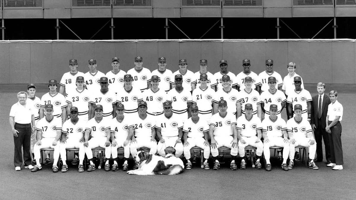 The 1990 Cincinnati Reds team poses for a photo at Riverfront Stadium.