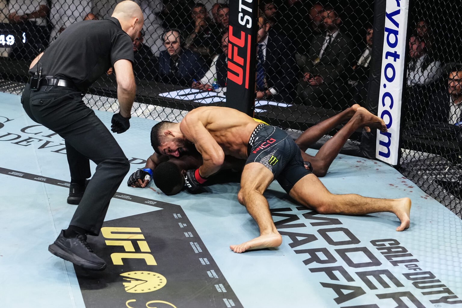 Aaron Pico punches Losene Keita on the ground during their fight at UFC 333