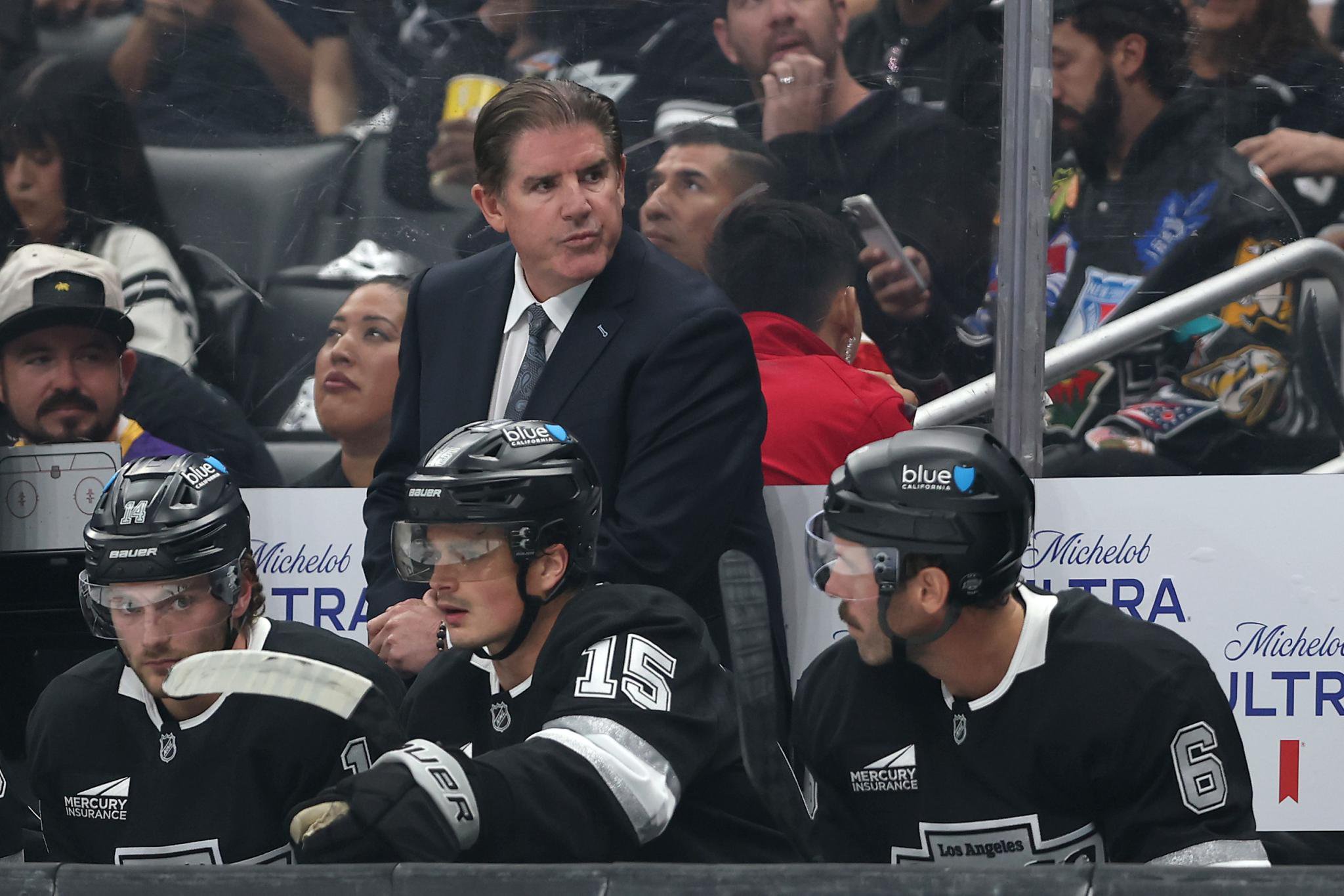 Los Angeles Kings head coach Peter Laviolette watches from the bench during a game against the Florida Panthers.