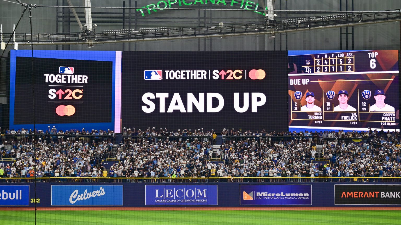 Fans, players and staff alike were all provided with placards to write the names of friends and loved ones affected by cancer.