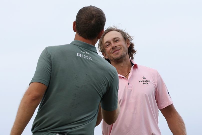 Seamus Power shakes hands with Austin Smotherman